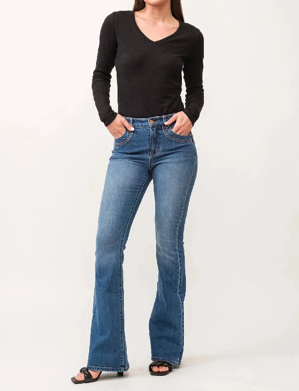 Essentials On Sale Laney Mid Rise Flare Jeans In Hugger